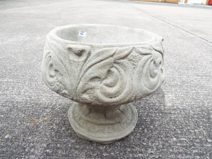 Garden Stoneware - A reconstituted stone fleur-de-lis urn.