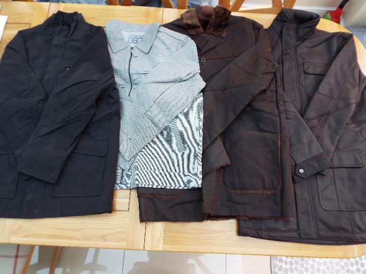 A job lot of four coats comprising r to l - Thomas Nash, brown size M, Simon Clark, brown size M,