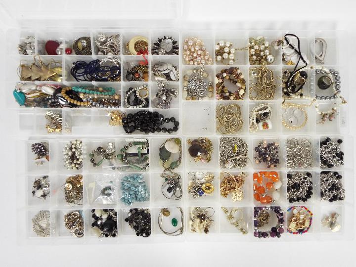Four trays of various costume jewellery