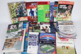 Football Programmes. A box containing a large amount of A4 size match programmes.