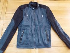 A blue / grey leather jacket with polyester lining by AIM, size L,