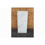 A white, veined marble counter top, appr