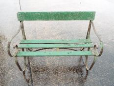 A cast iron and wood garden bench.