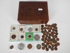 Various foreign coins to include Canadian, Chinese, French, German, Mexican and other.