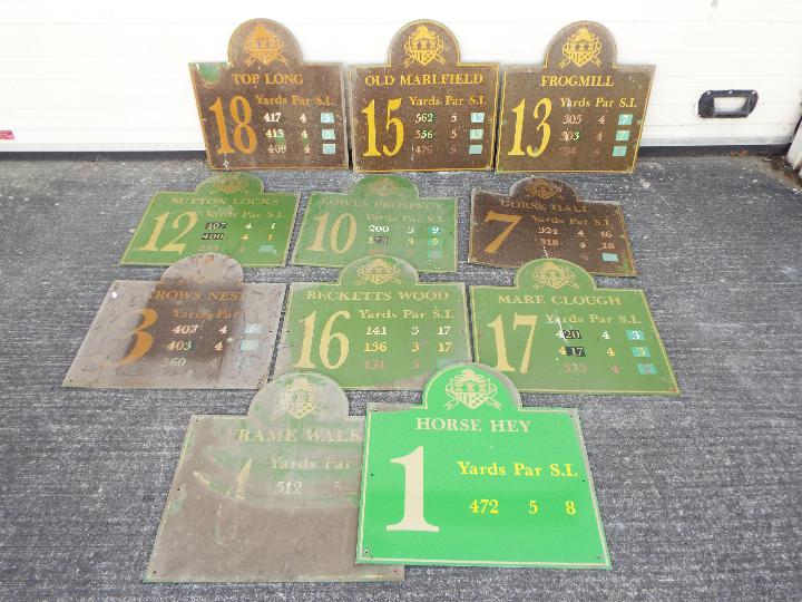 A quantity of eleven metal golf-course signs.