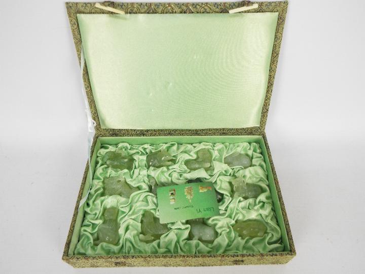 A set of Chinese zodiac jade carvings contained in presentation box. - Image 8 of 8