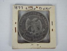 Silver coin - An 1877 US Trade Dollar, San Francisco mint.