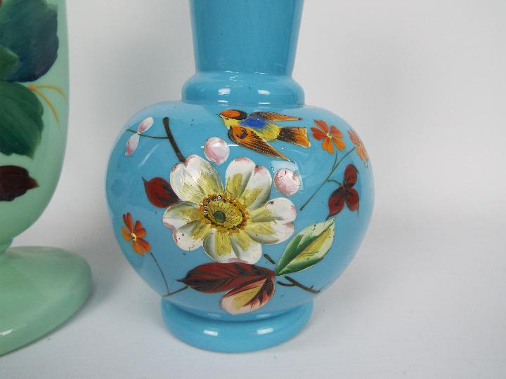 Two glass vases with hand painted floral decoration, largest approximately 27 cm (h). - Image 2 of 3