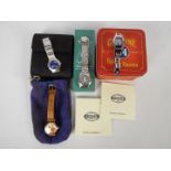 A collection of watches to include an Opex Snoopy watch, Timex Winnie The Pooh and similar.