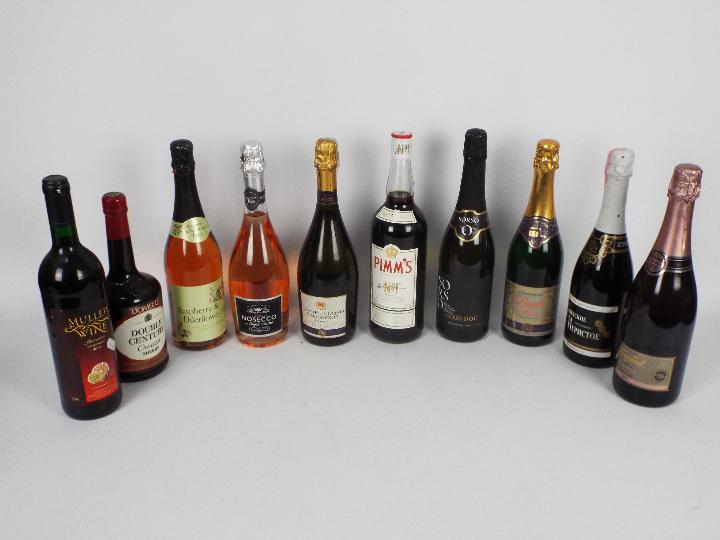 Ten bottles of drink to include Pimms, sherry, prosecco and similar.