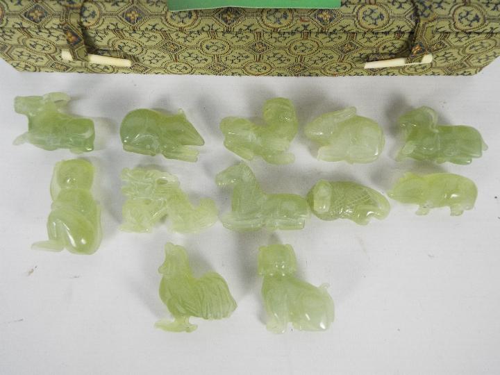 A set of Chinese zodiac jade carvings contained in presentation box. - Image 2 of 8