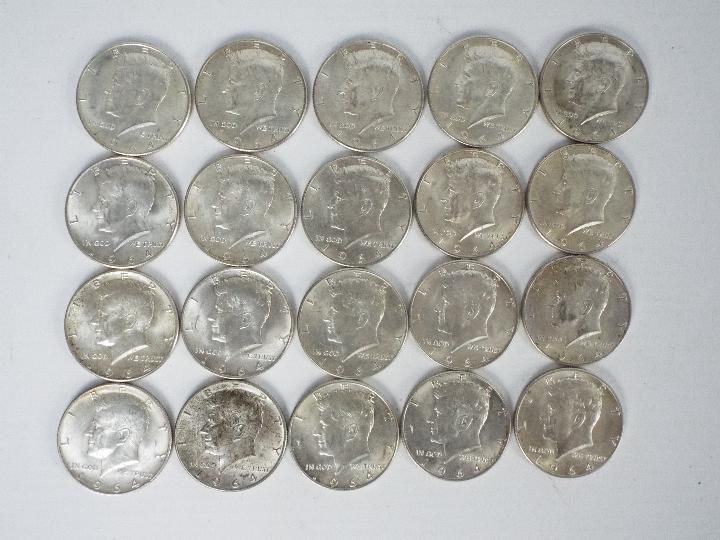 US Silver Coin Group - Twenty 1964 Kennedy Half Dollar coins.