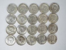 US Silver Coin Group - Twenty 1964 Kennedy Half Dollar coins.