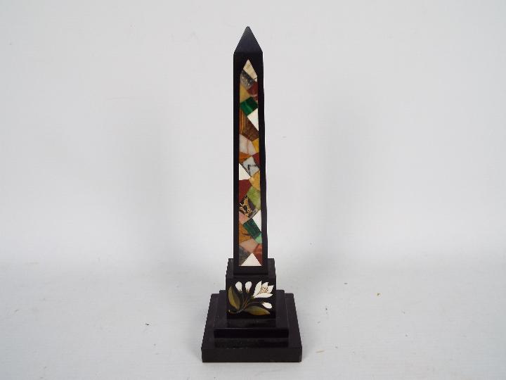 A pietra dura obelisk on stepped base, approximately 26 cm (h).