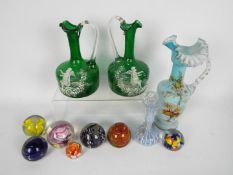 Glassware to include paperweights, jugs, vase, largest approximately 27 cm (h).