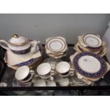 A quantity of Minton tea wares in the Barchester pattern, approximately 45 pieces.