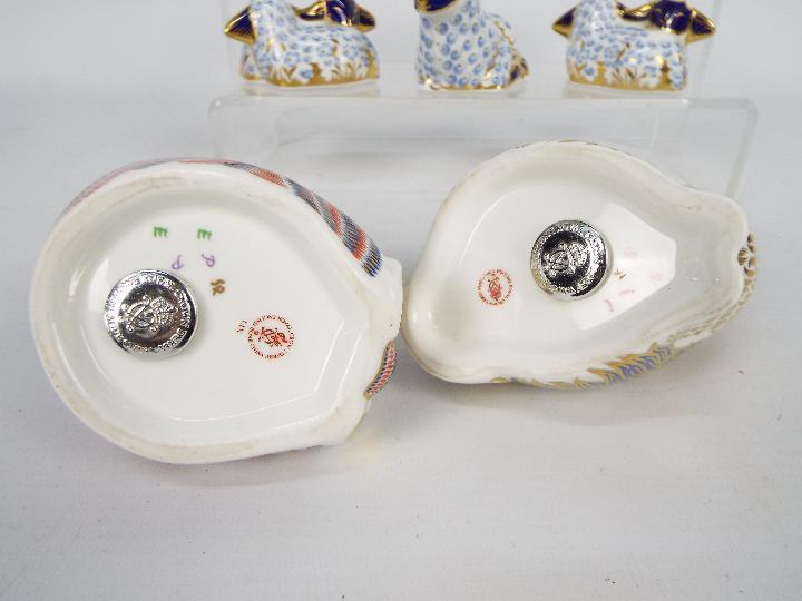 Royal Crown Derby - A collection of paperweights, all with silver stoppers to include a Spaniel, - Image 3 of 5