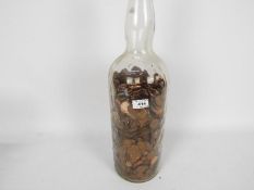 Penny Jar - a vintage glass Bells whisky bottle,