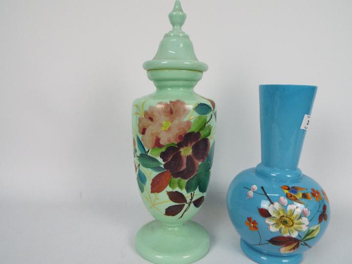Two glass vases with hand painted floral decoration, largest approximately 27 cm (h). - Image 3 of 3