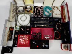 Various pieces of boxed costume jewellery to include rings, earrings, necklaces,