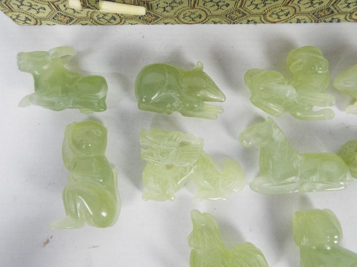 A set of Chinese zodiac jade carvings contained in presentation box. - Image 3 of 8