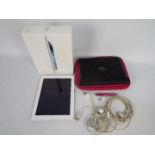 Apple iPad 16 GB in white, model A1416 with original box, case and cover and an iPod.