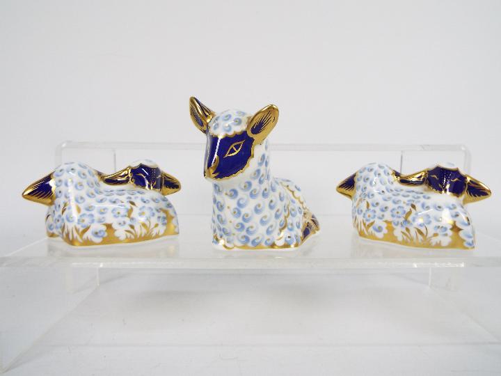 Royal Crown Derby - A collection of paperweights, all with silver stoppers to include a Spaniel, - Image 4 of 5