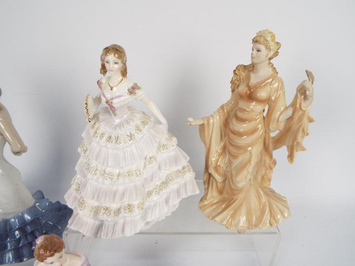 A collection of figurines comprising two Nao, one Wedgwood, one Royal Worcester and one Coalport, - Image 2 of 6