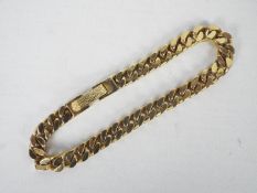 A 9ct yellow gold bracelet, 17 cm (l), approximately 21 grams all in.