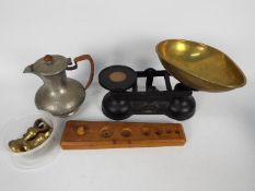 Liberty & Co - A Tudric coffee pot, pattern 1324 and a set of kitchen scales and weights.