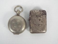 A small Victorian vesta case with engraved decoration, Birmingham assay 1889,