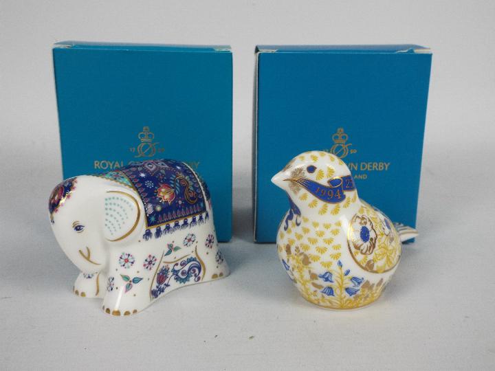 Royal Crown Derby - Two boxed paperweights to include Sitara baby elephant and Linnet 25 Year Guild