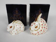 Royal Crown Derby - Two boxed rabbit form paperweights to include Red Rabbit and Baby Red Rabbit,