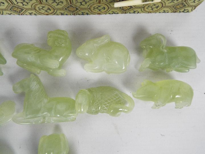 A set of Chinese zodiac jade carvings contained in presentation box. - Image 5 of 8