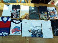 A job lot of 12 various tee shirts, predominantly pictorial images on various colours,