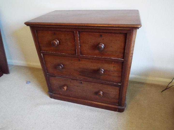 A mahogany chest of two over two drawers, bun handles, - Image 2 of 2