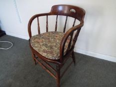 A Victorian oak desk chair,