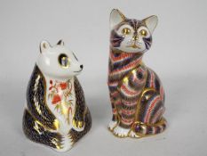 Royal Crown Derby - Two paperweights comprising Cat (gold stopper) and Panda (gold stopper).
