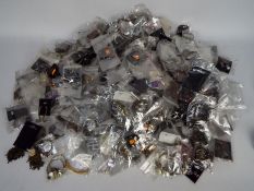 A very large quantity of individually bagged costume jewellery.