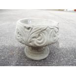 Garden Stoneware - A reconstituted stone fleur-de-lis urn.