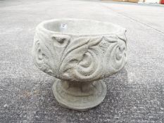 Garden Stoneware - A reconstituted stone fleur-de-lis urn.