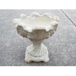 Garden Stoneware - A reconstituted stone urn of tulip form on hexagonal base