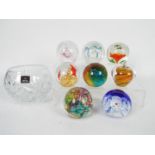 A collection of paperweights to include Caithness,