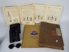 Lot to include cigarette card albums, 1937 Coronation souvenir book and a cased set of binoculars.
