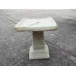 Garden Stoneware - A reconstituted stone bird bath with square top and rose decoration