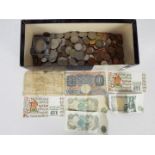 A collection of UK and foreign coins, commemorative coins and banknotes,
