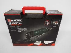 A Parkside Air Multi Tool, model PDMFW 15 A1 contained in carry case and original packaging.