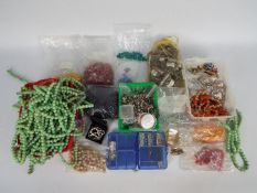 A collection of unused Palloy zinc alloy beads, jewellery crafting equipment,
