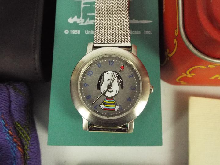 A collection of watches to include an Opex Snoopy watch, Timex Winnie The Pooh and similar. - Image 4 of 5