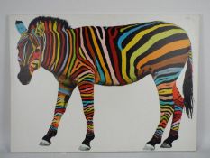 A print on canvas depicting a multicoloured zebra, approximately 66 cm x 91 cm.